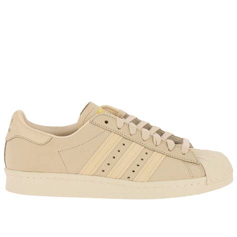 beige adidas women shoes.